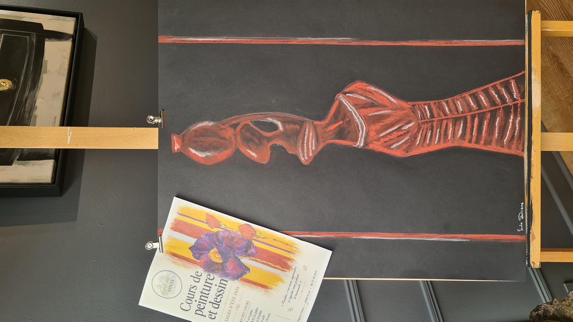 Pastel à la sanguine d'une silhouette africaine réalisé par une élève