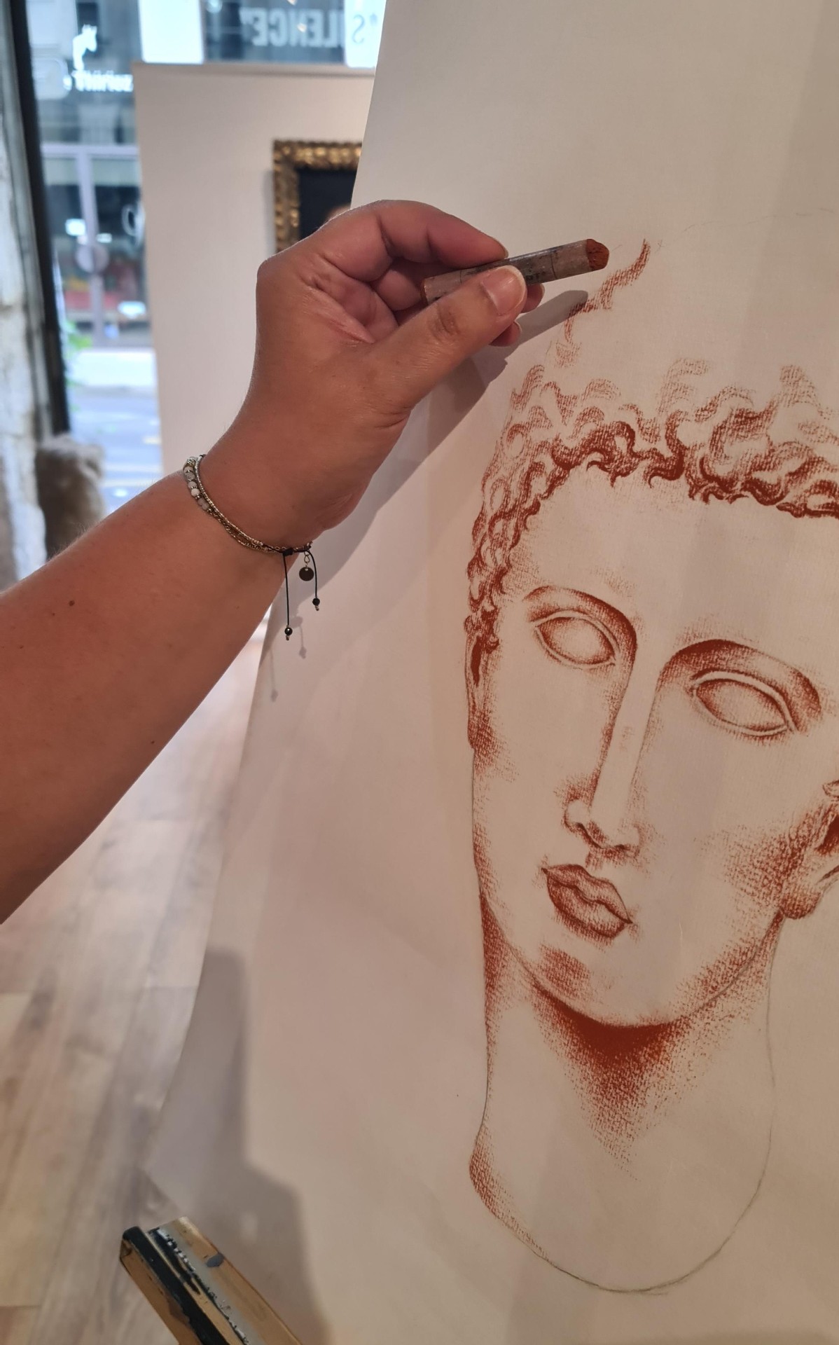 Dessin à la sanguine réalisé par une élève de l'atelier